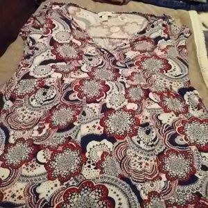 Women's cross body with crop sleeve top.